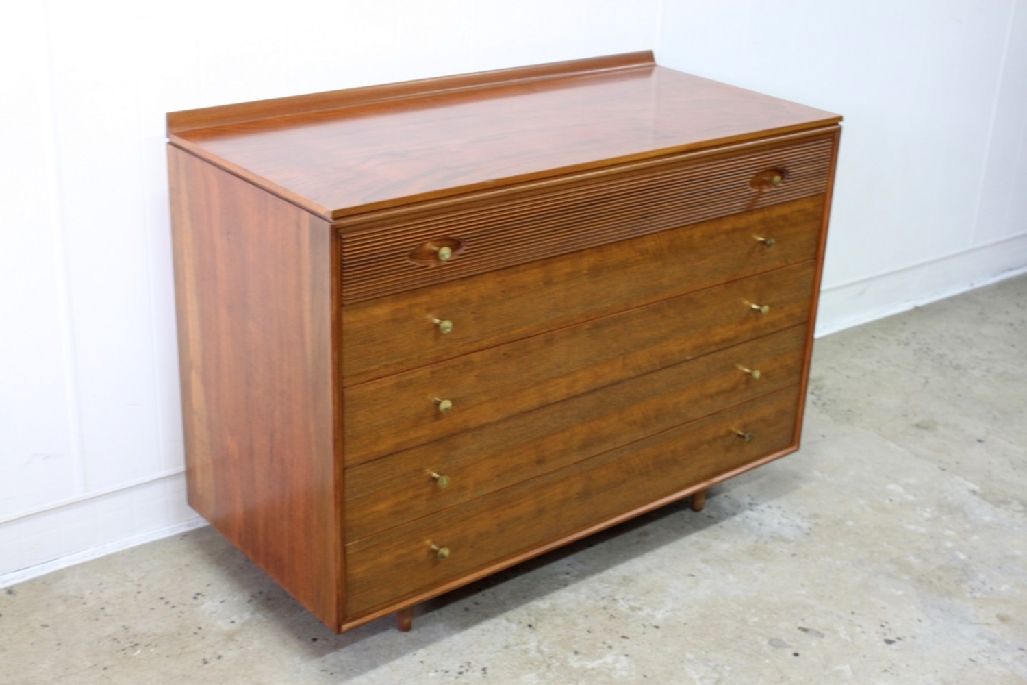 Pair of low drawers by Archie Shine