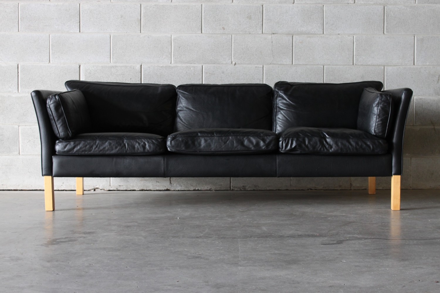 Black Leather Three Seater Sofa