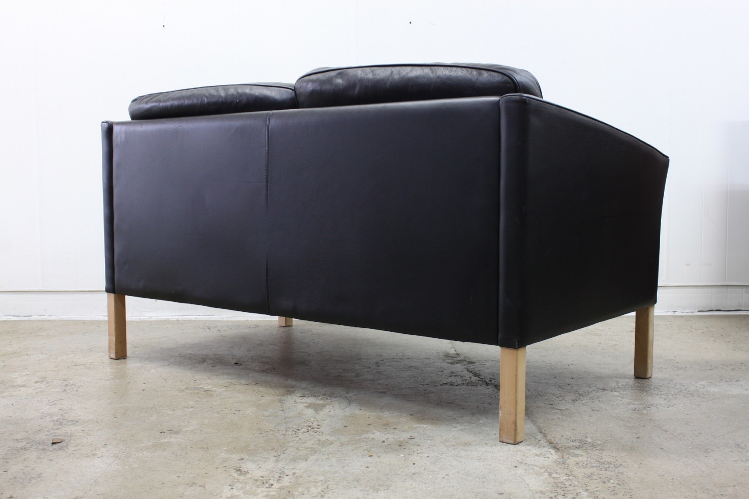 Two seater Black Leather Sofa by Stouby