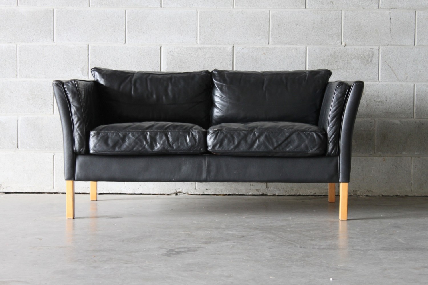 Pair of Black Leather Sofas
