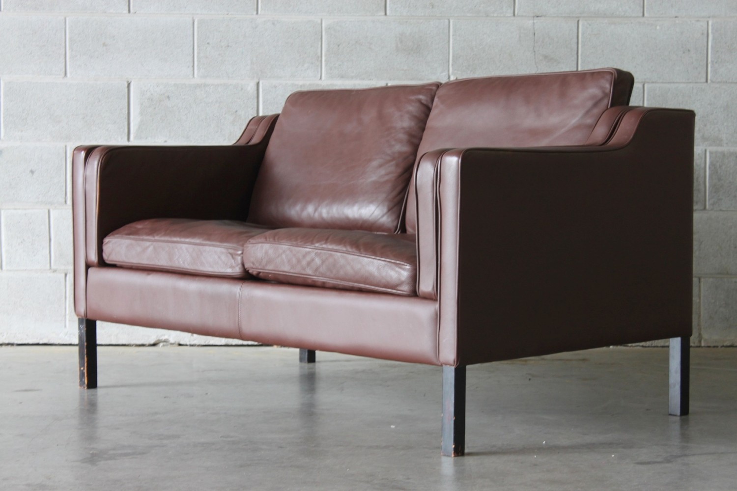 Pair of Brown Leather Sofas