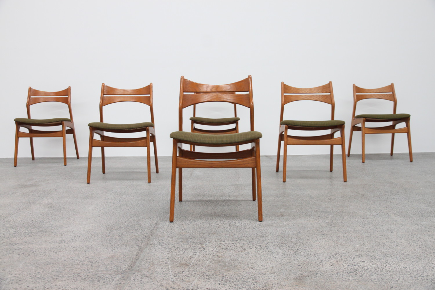 Oak dining chairs by Erik Buch