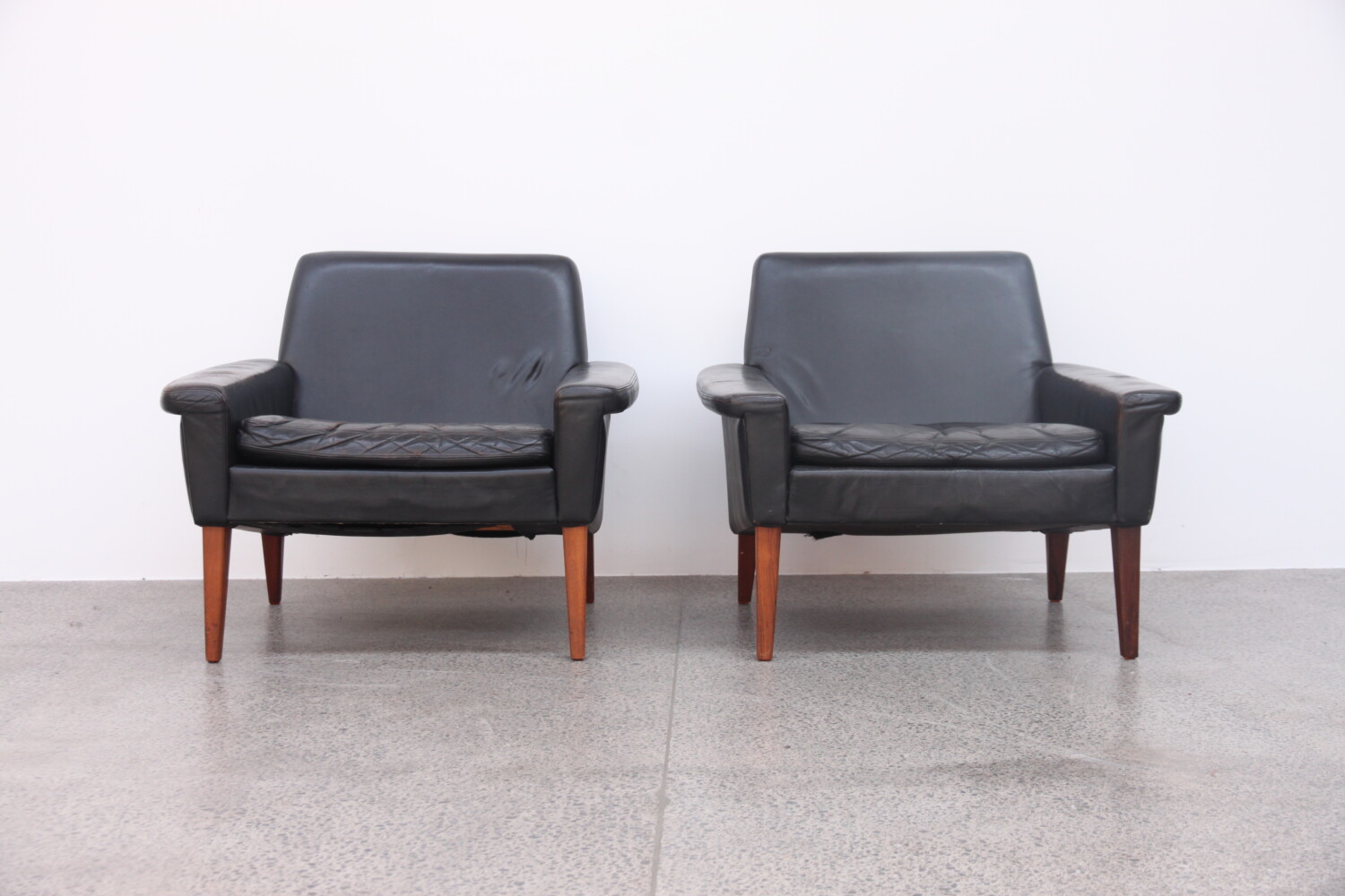 Pair of Black Leather Armchairs