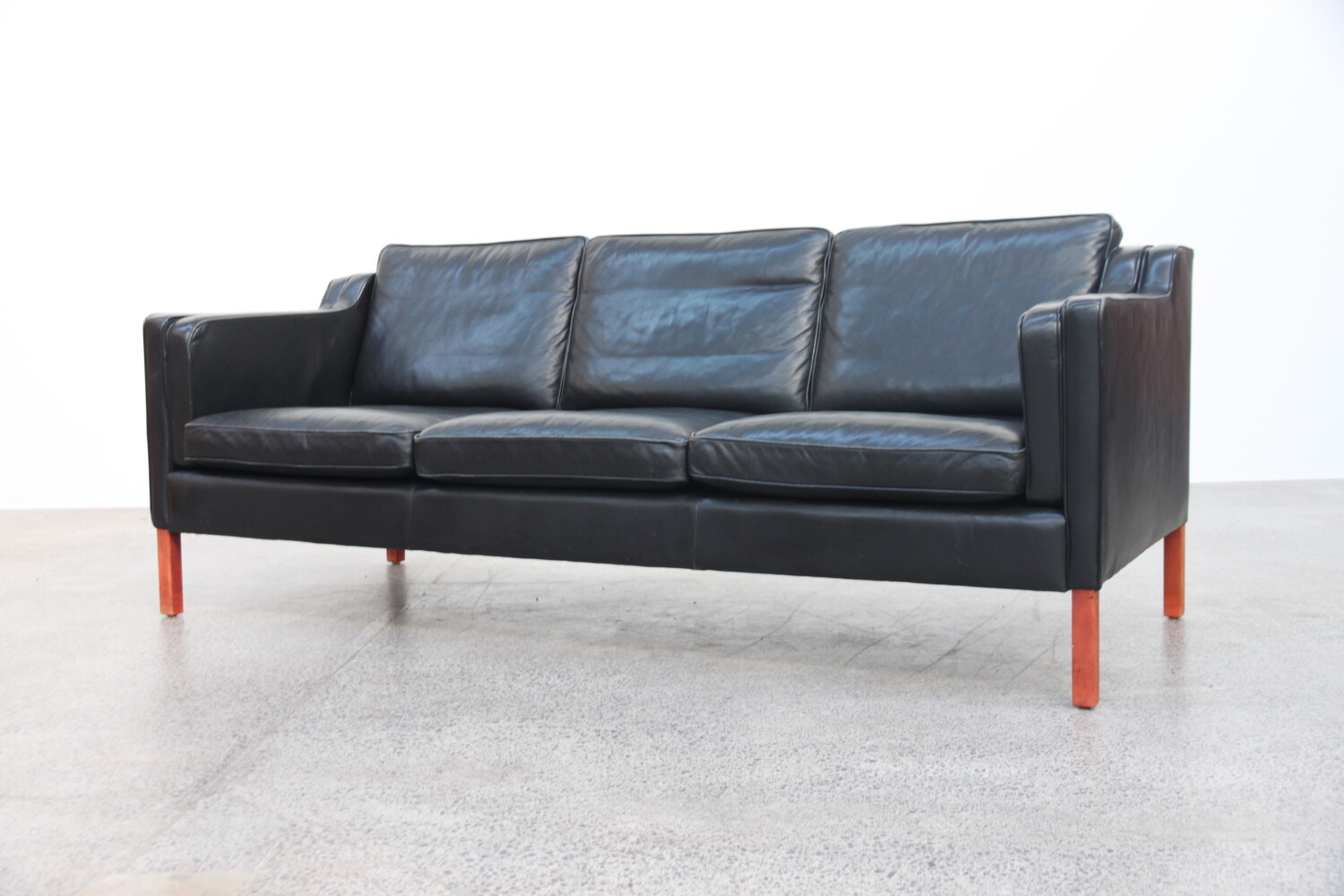 Pair of Black Leather Sofas Model ‘Eva’