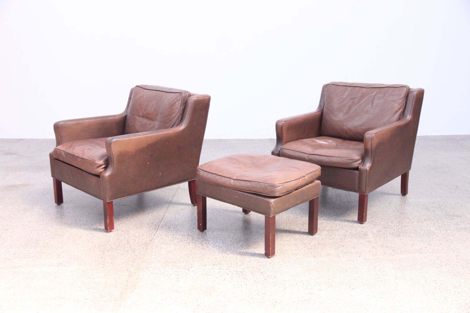 Pair of Brown Leather Armchairs