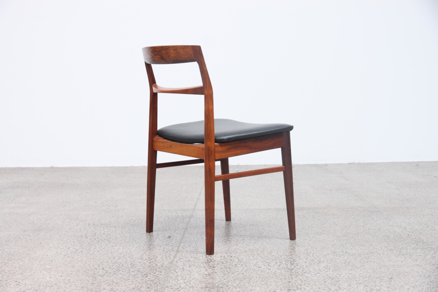 Rosewood Dining Chairs by Henning Kjaernulf Sold