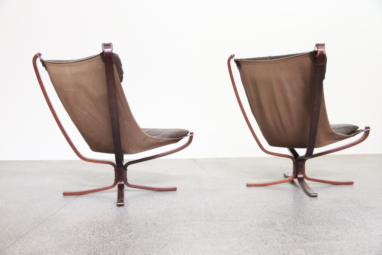 Pair of High back Falcon Chairs Sold