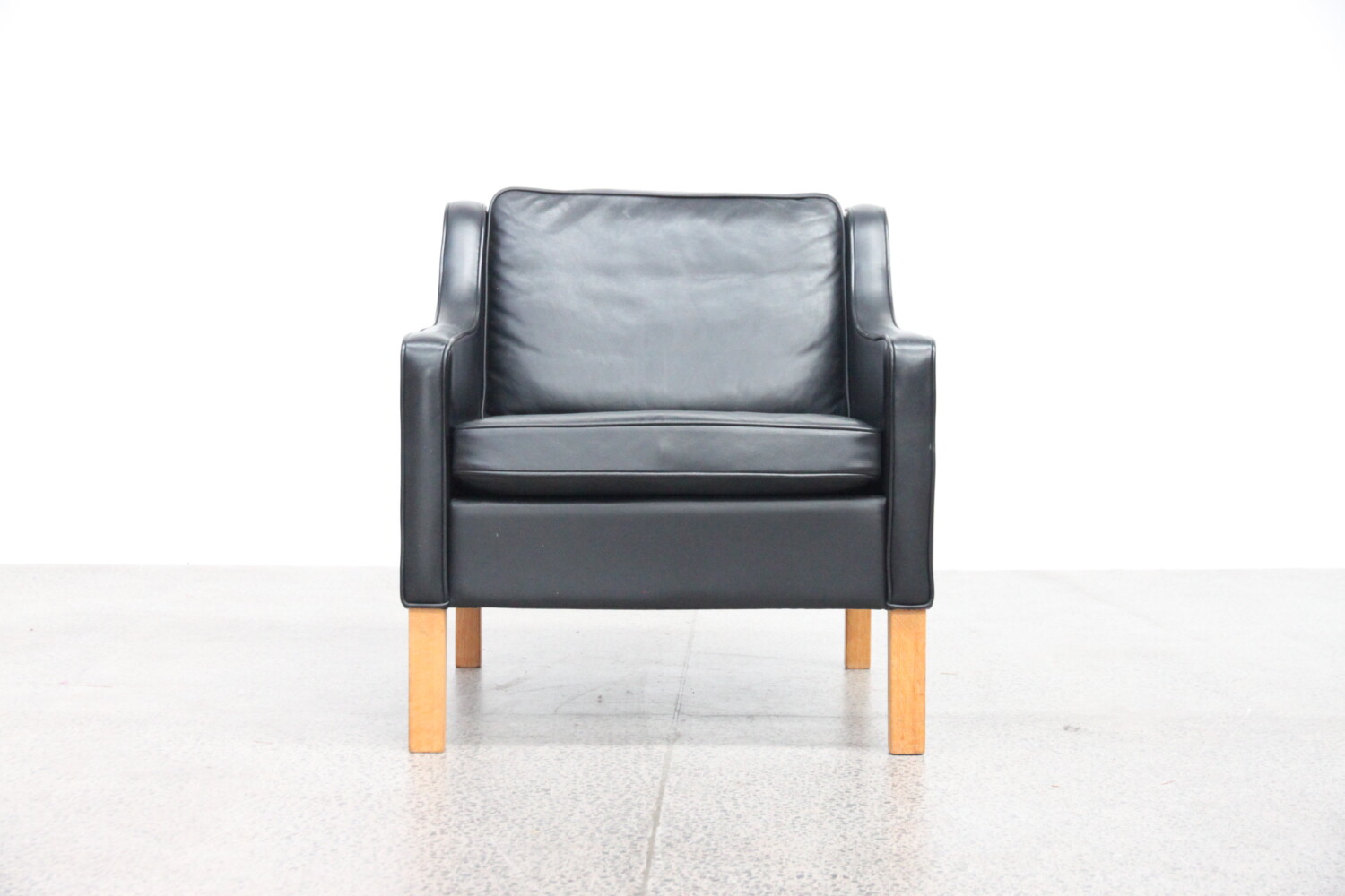 Black Leather Lowback Armchair