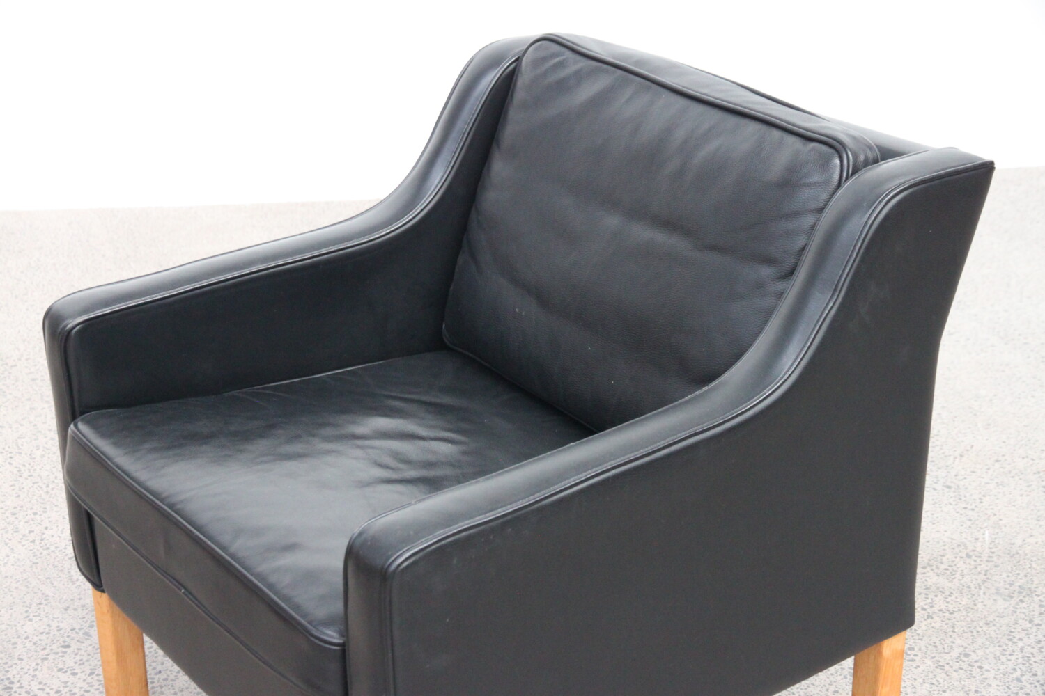 Black Leather Lowback Armchair