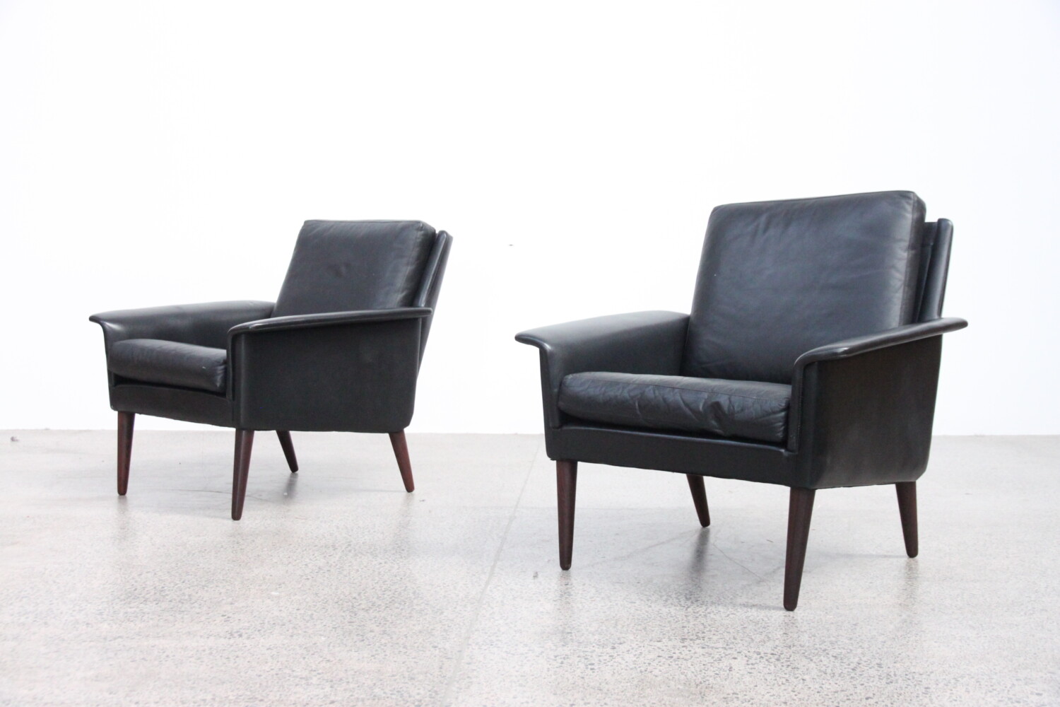 Pair of Black Leather Armchairs by H W Klein