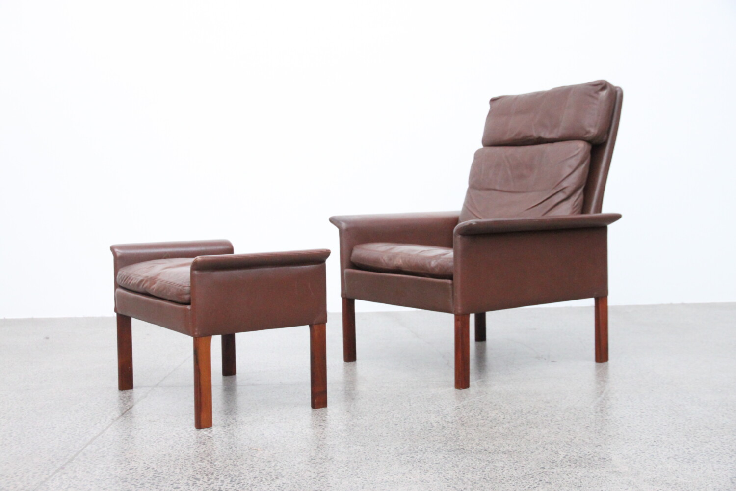 Leather Armchair & footstool by Hans Olsen