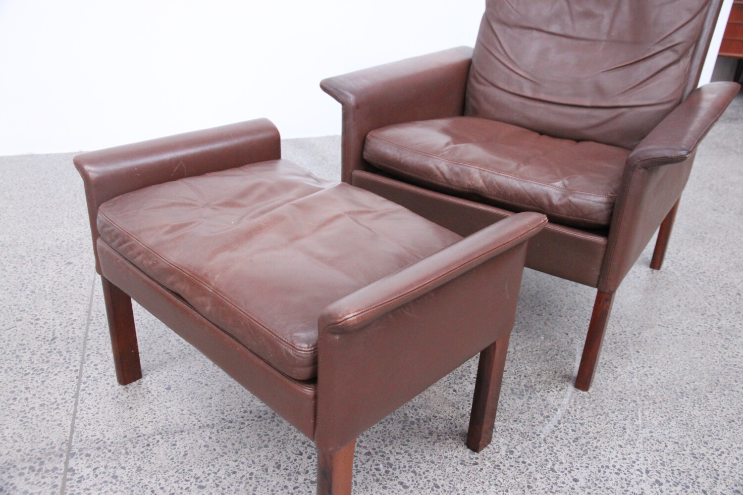 Leather Armchair & footstool by Hans Olsen