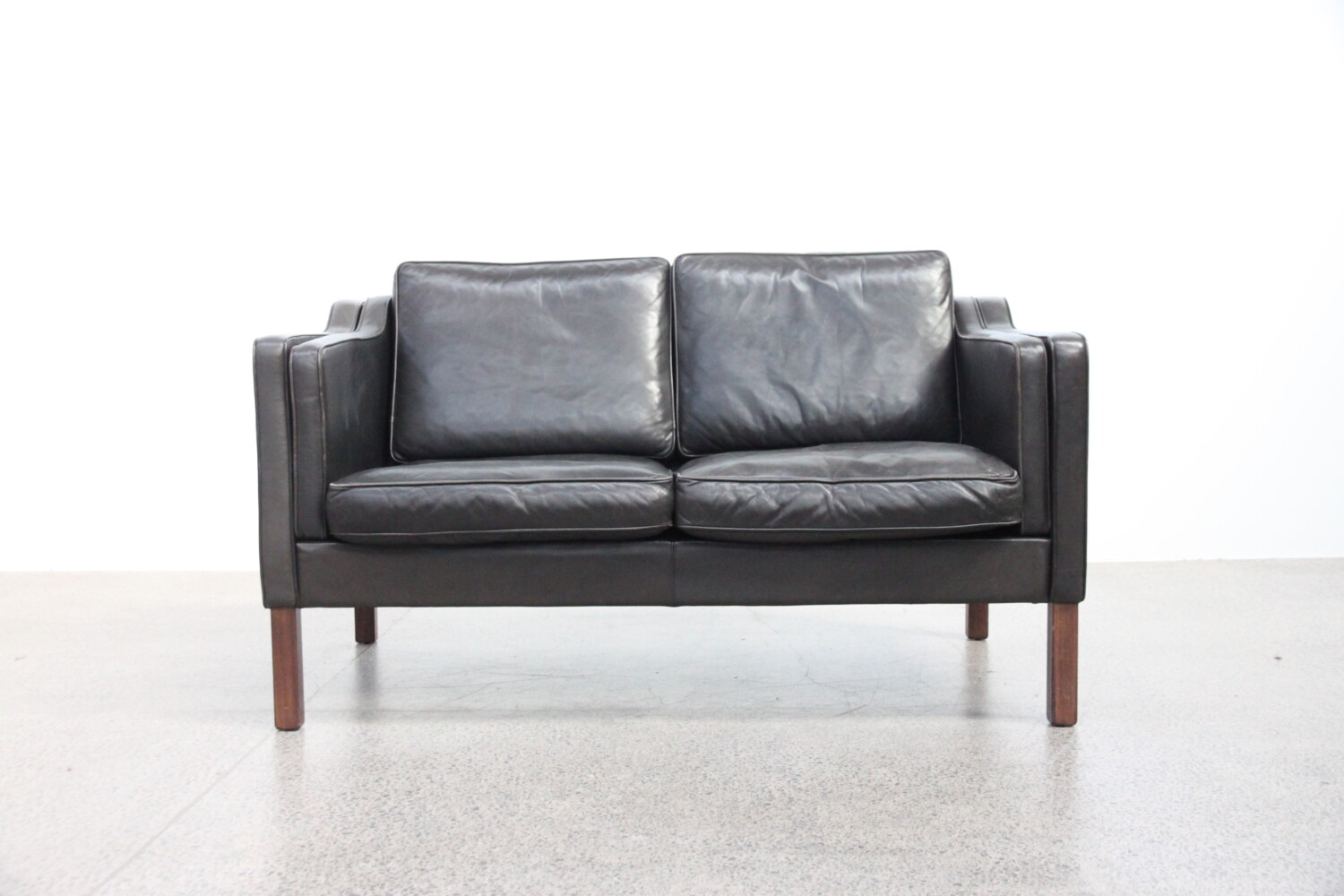 Pair of Leather Two Seater Sofas