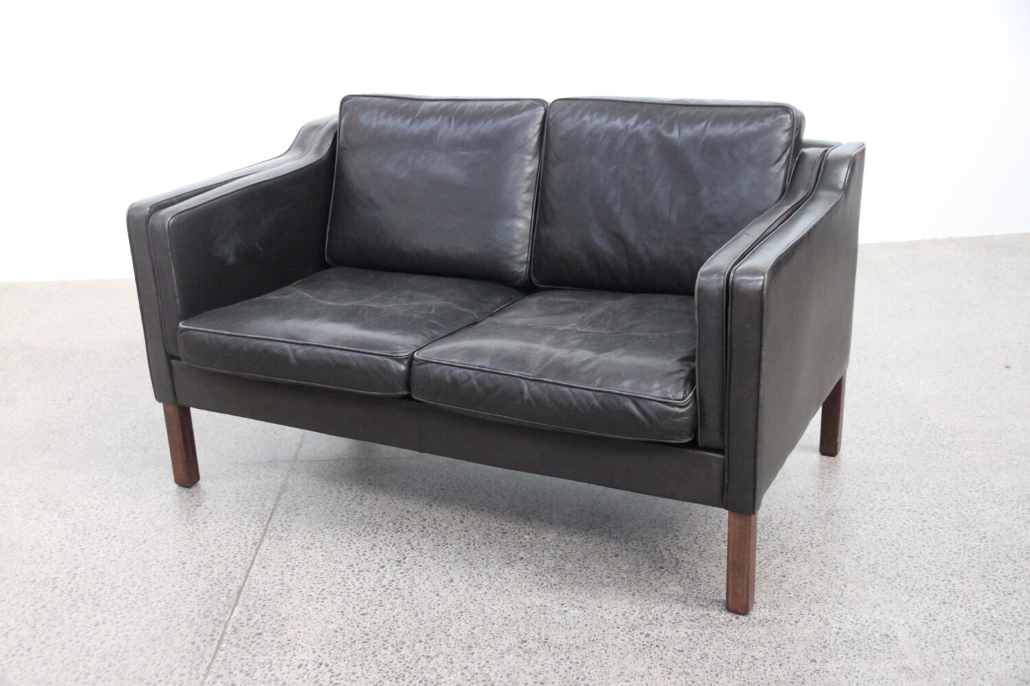 Pair of Leather Two Seater Sofas