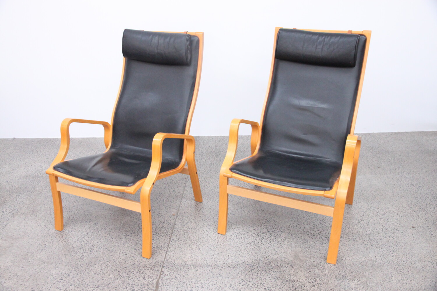 Pair of Leather Chairs by Finn Ostergaard