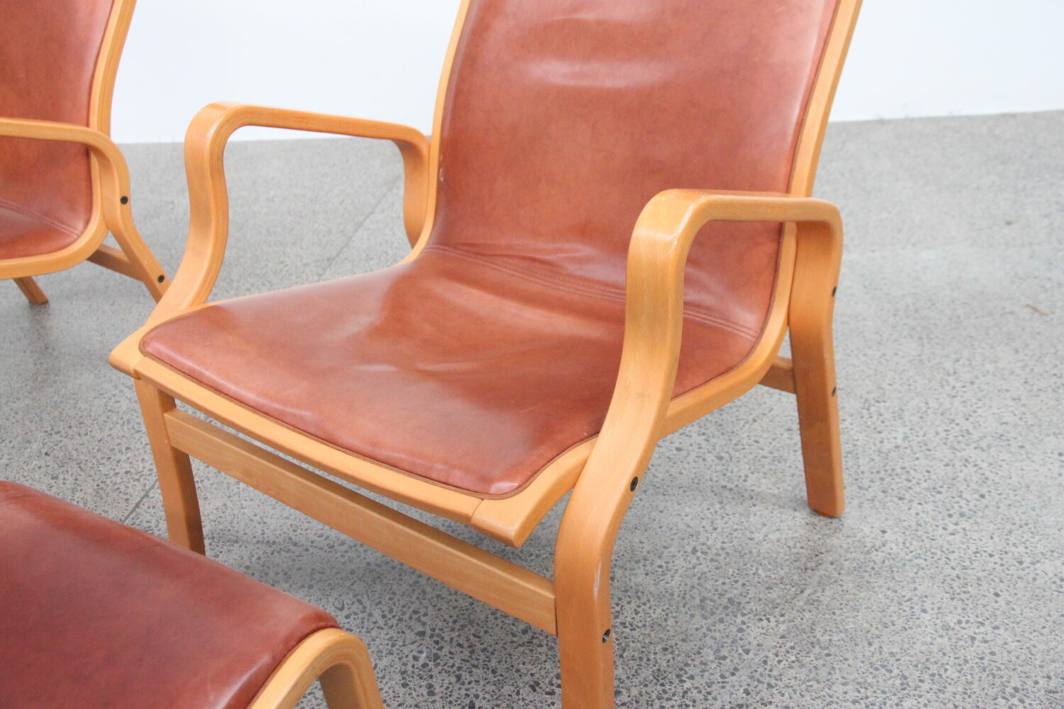 Pair of Tan Leather Armchairs by Finn Ostergaard