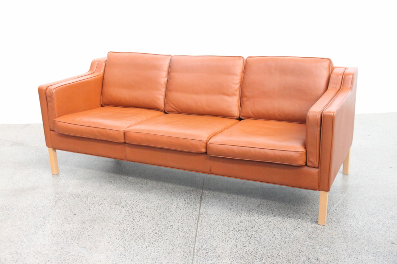 Pair of Tan Sofas with Stool by Stouby