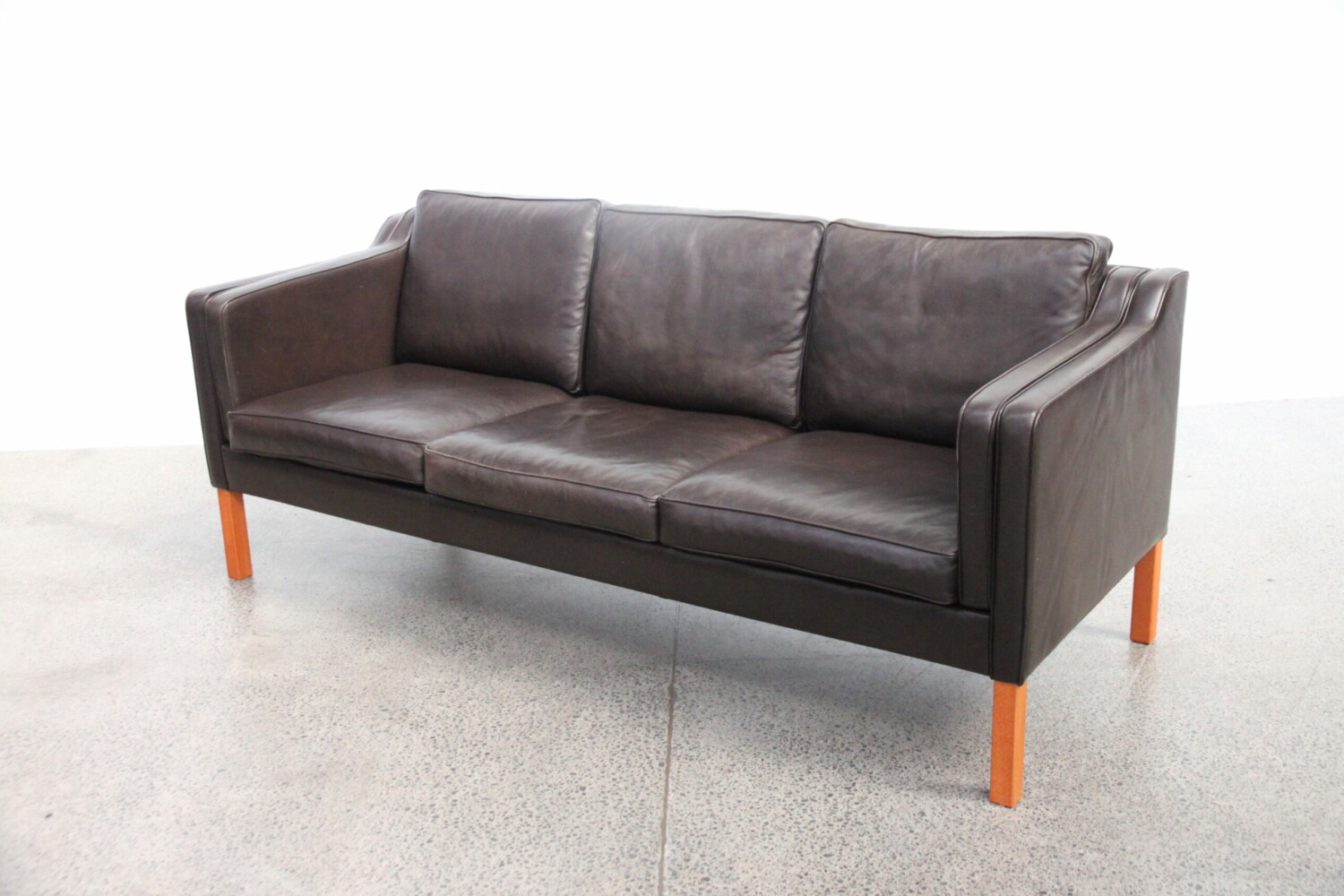 Pair of brown leather sofas