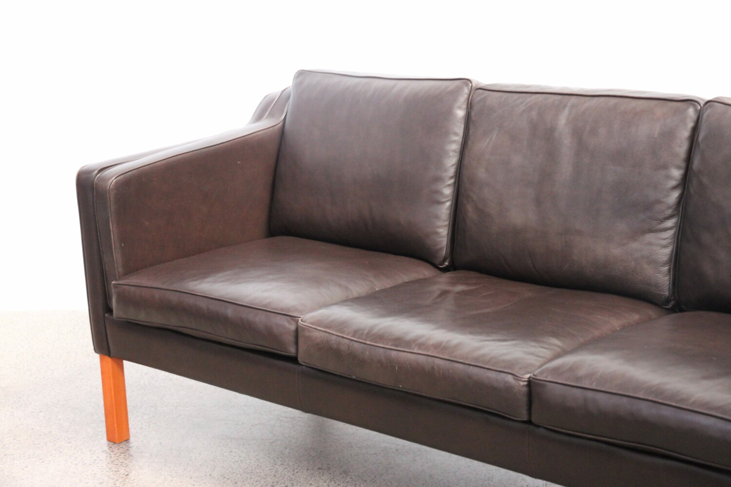 Pair of brown leather sofas