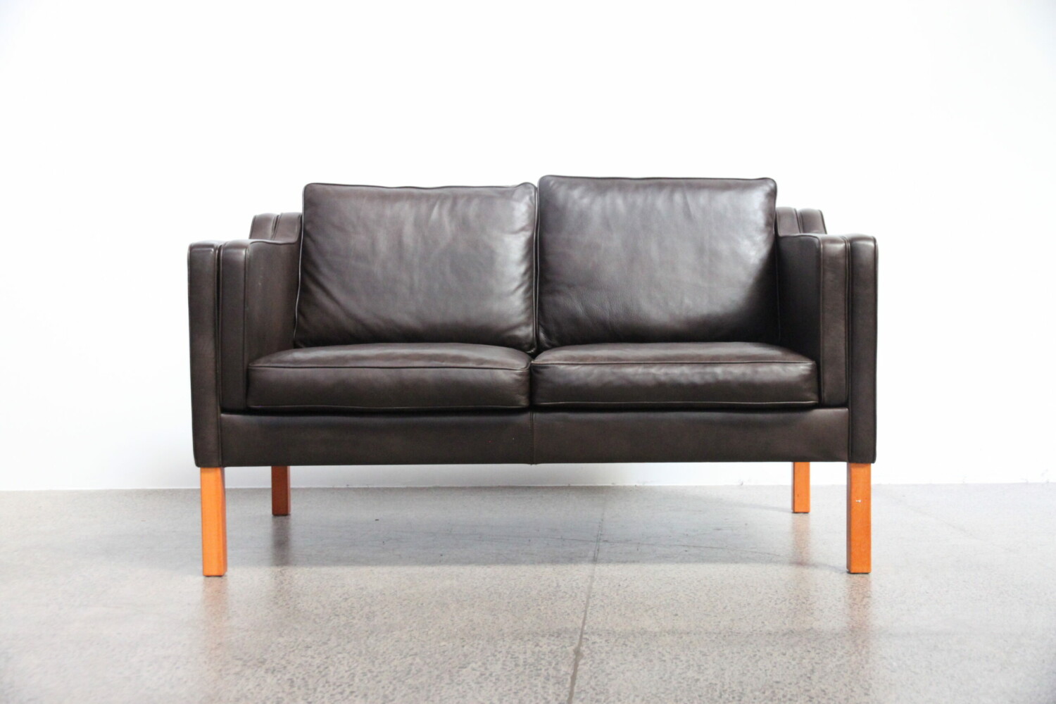 Pair of brown leather sofas
