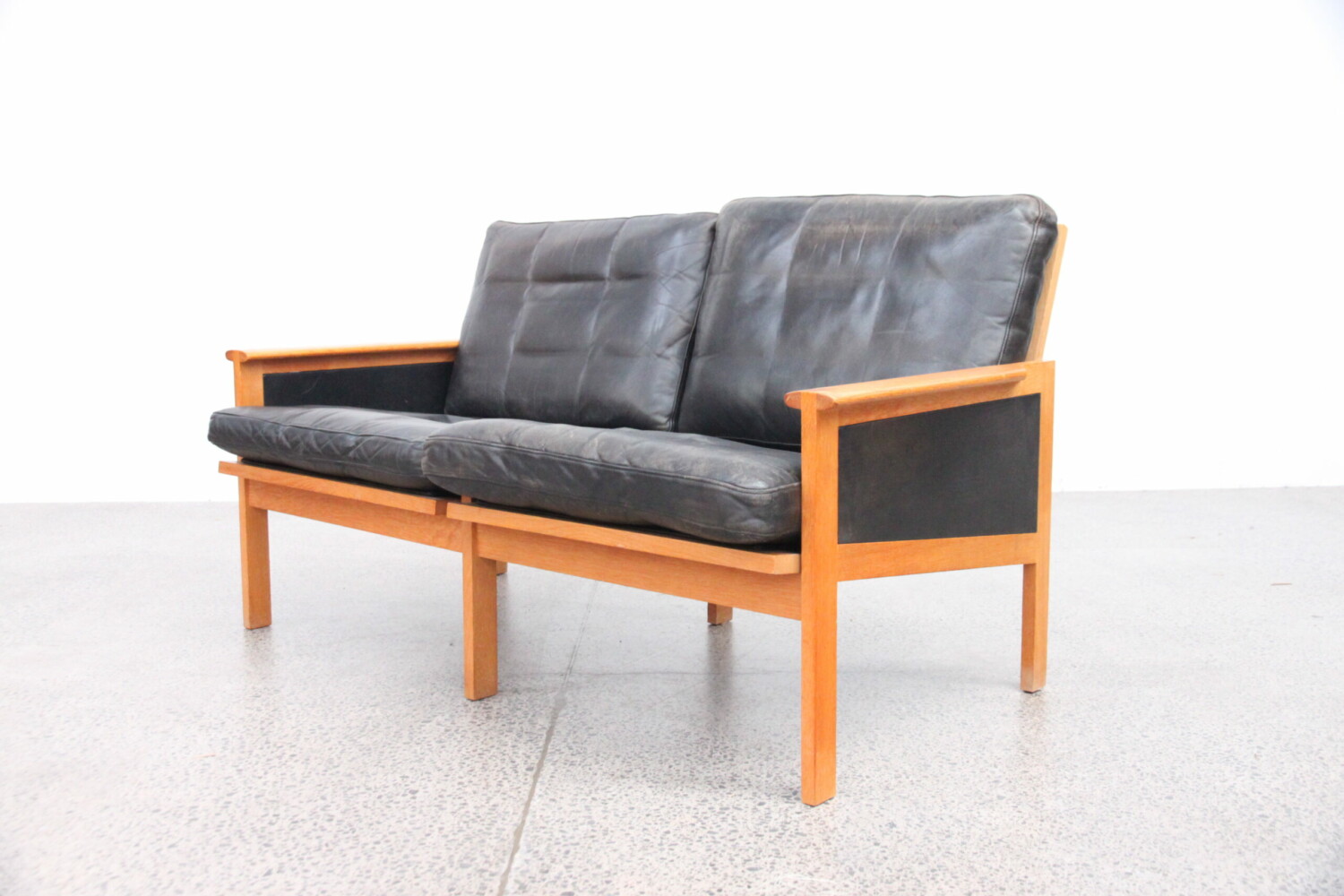 Oak & leather armchairs by Illum Wikkelso