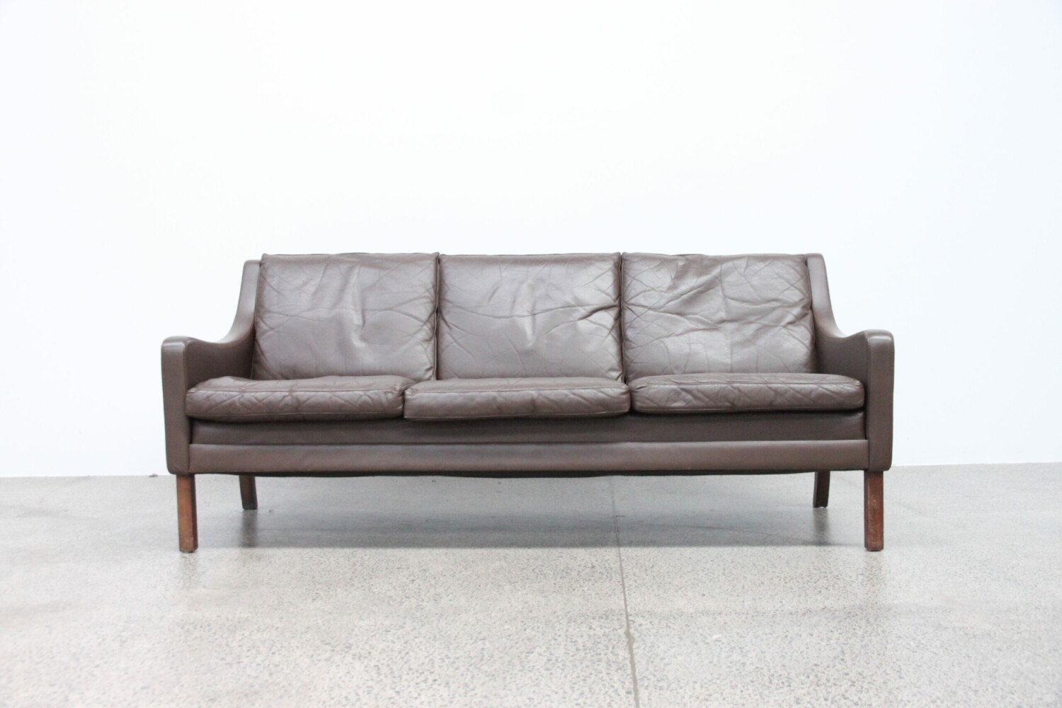 Compact Brown Three Seater Sofa