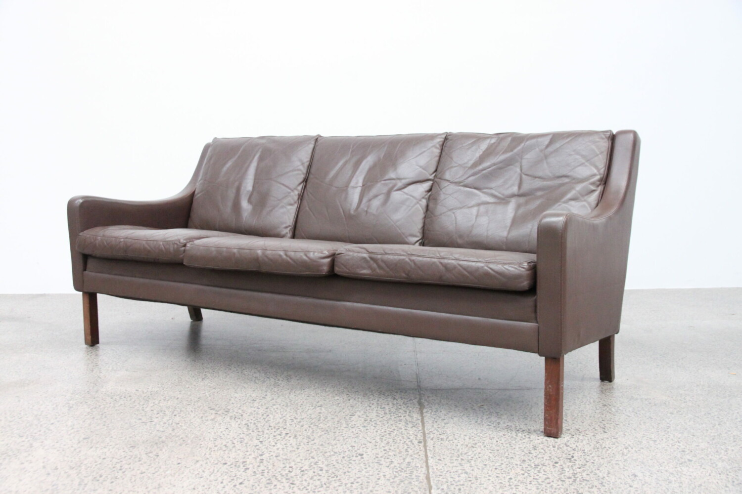 Compact Brown Three Seater Sofa