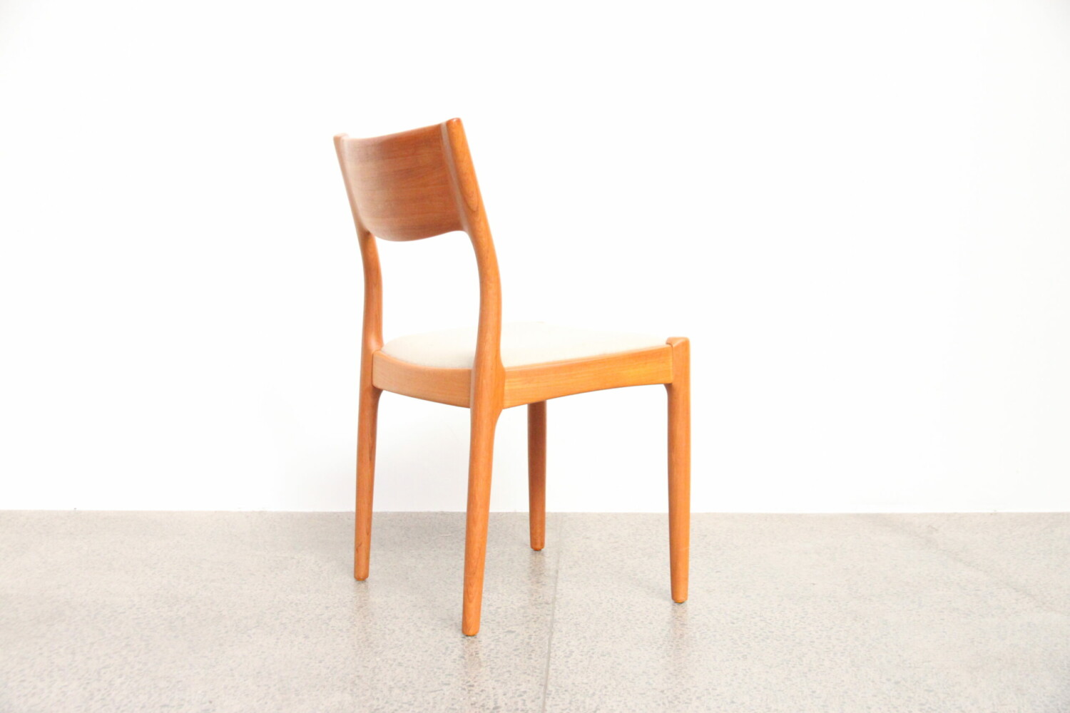 Ten Teak Dining Chairs by Juul Kristensen