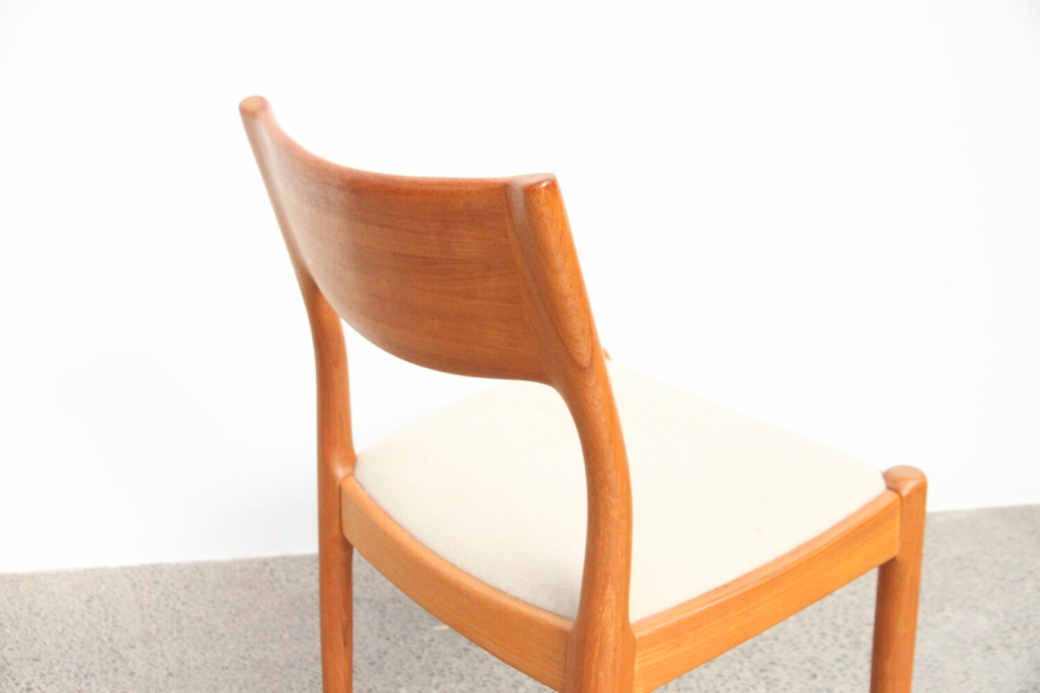 Ten Teak Dining Chairs by Juul Kristensen