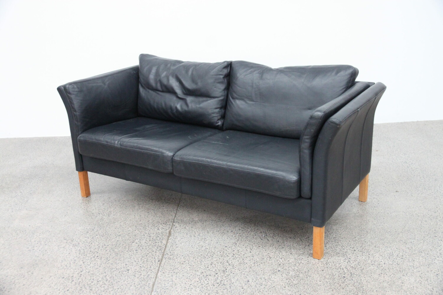 Pair of Black Leather Sofas by Skalma