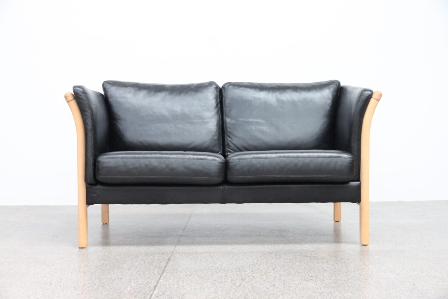Pair of Black Leather Sofas