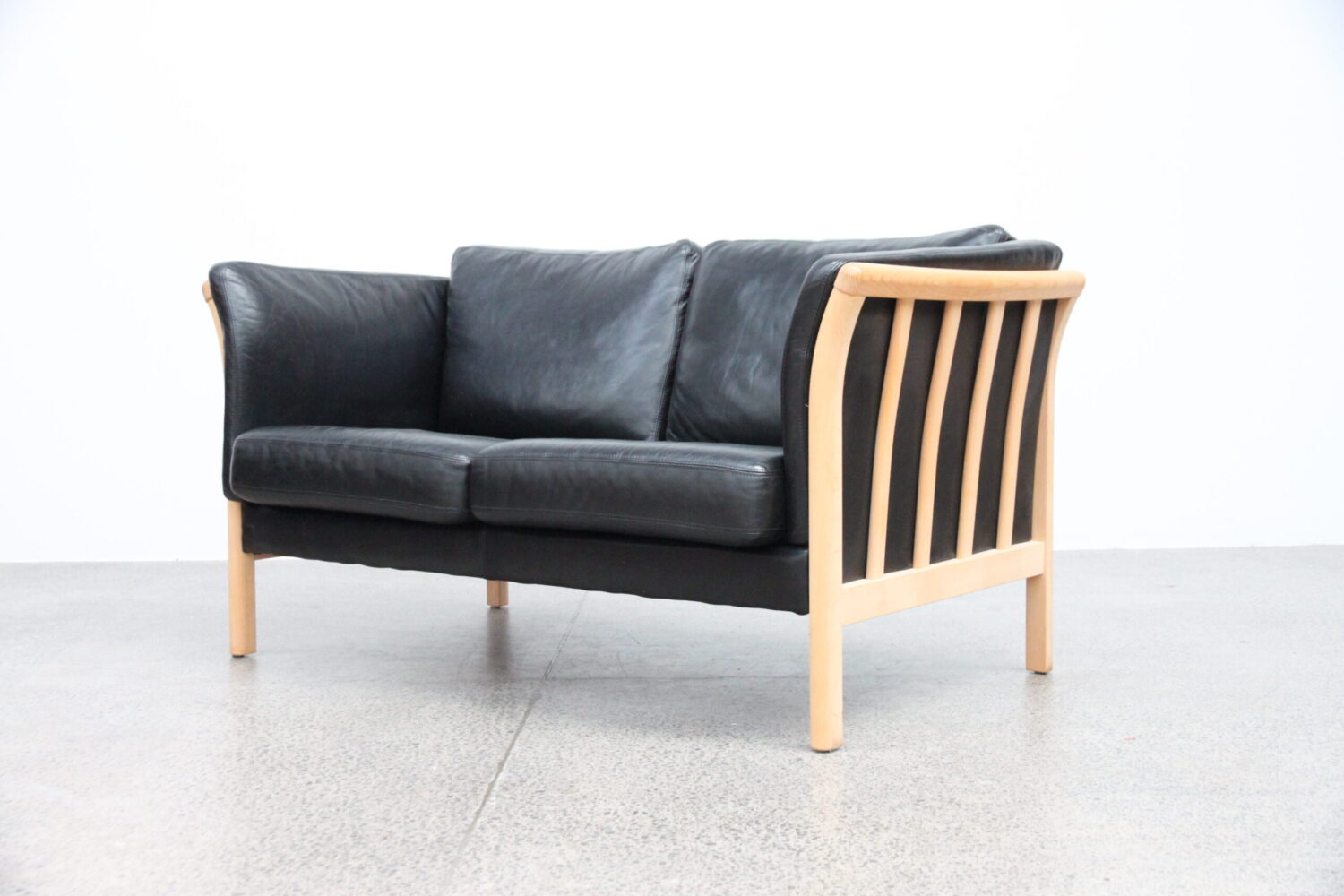 Pair of Black Leather Sofas