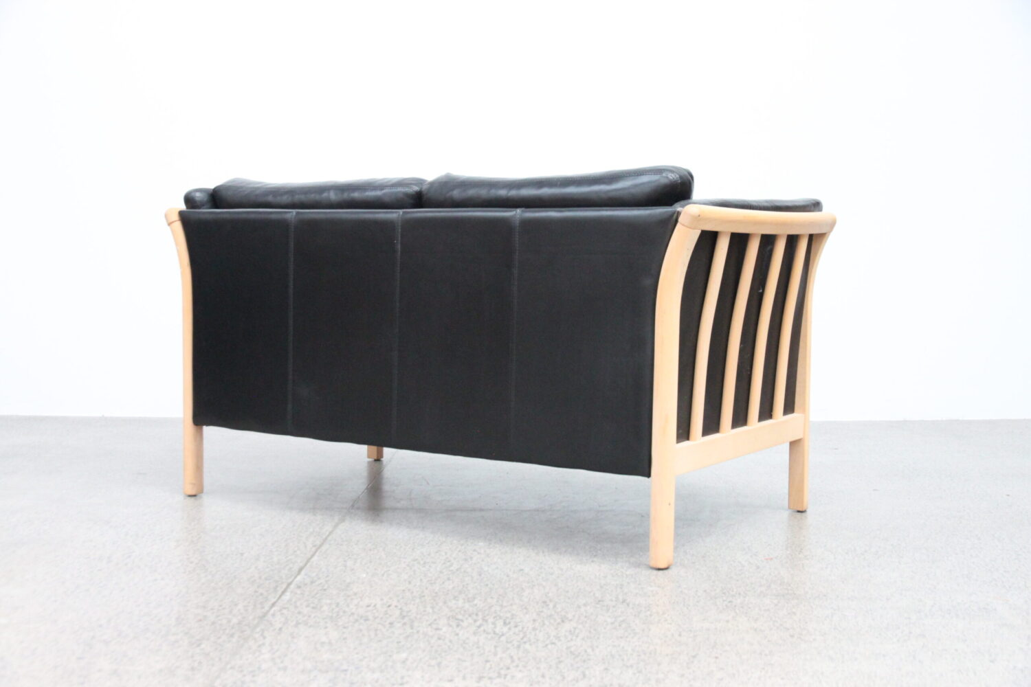 Pair of Black Leather Sofas