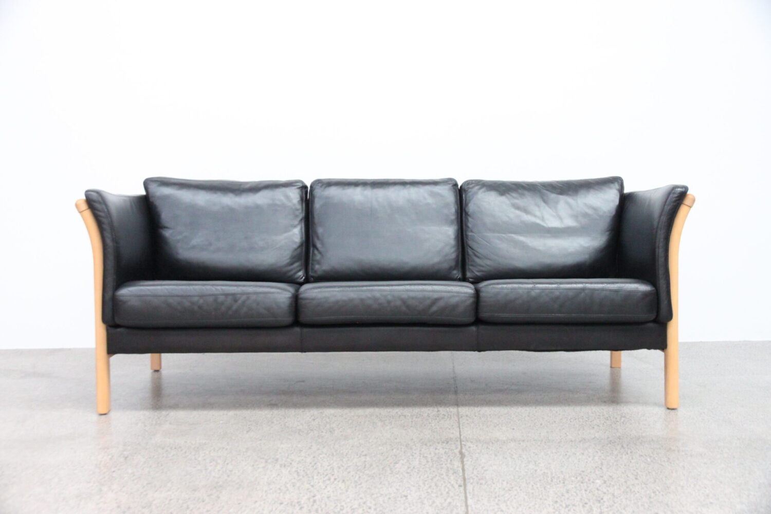 Pair of Black Leather Sofas