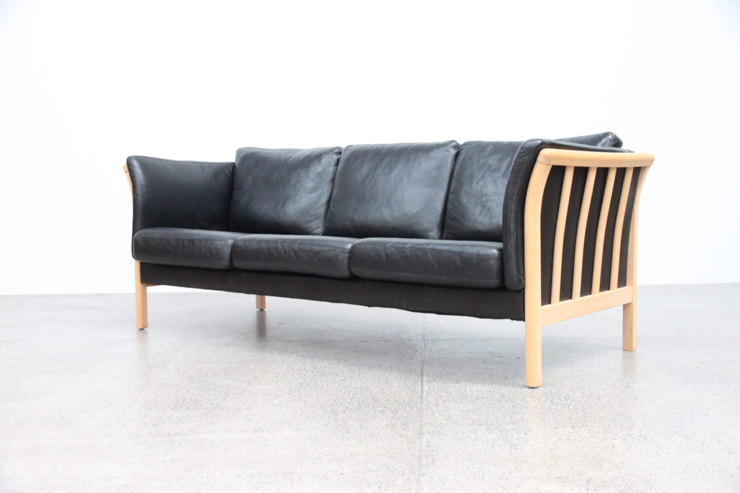 Pair of Black Leather Sofas