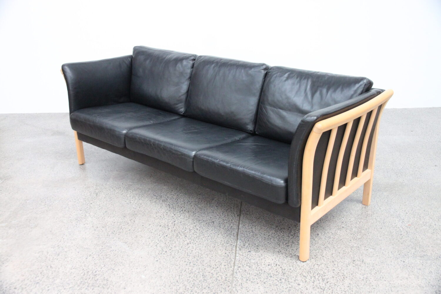 Pair of Black Leather Sofas