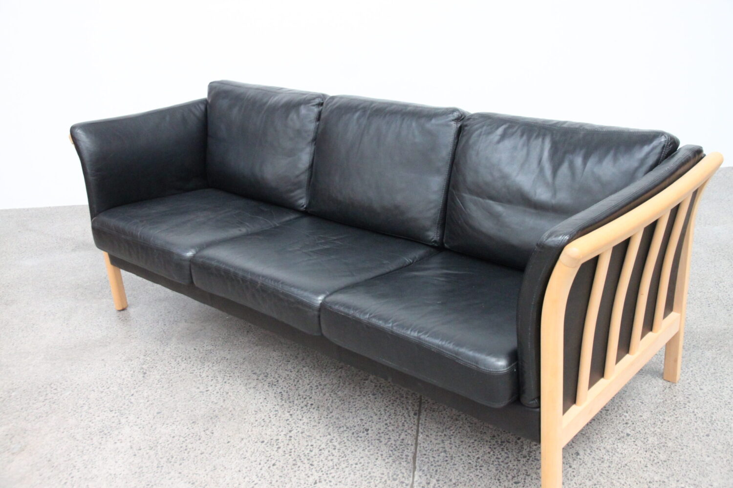 Pair of Black Leather Sofas