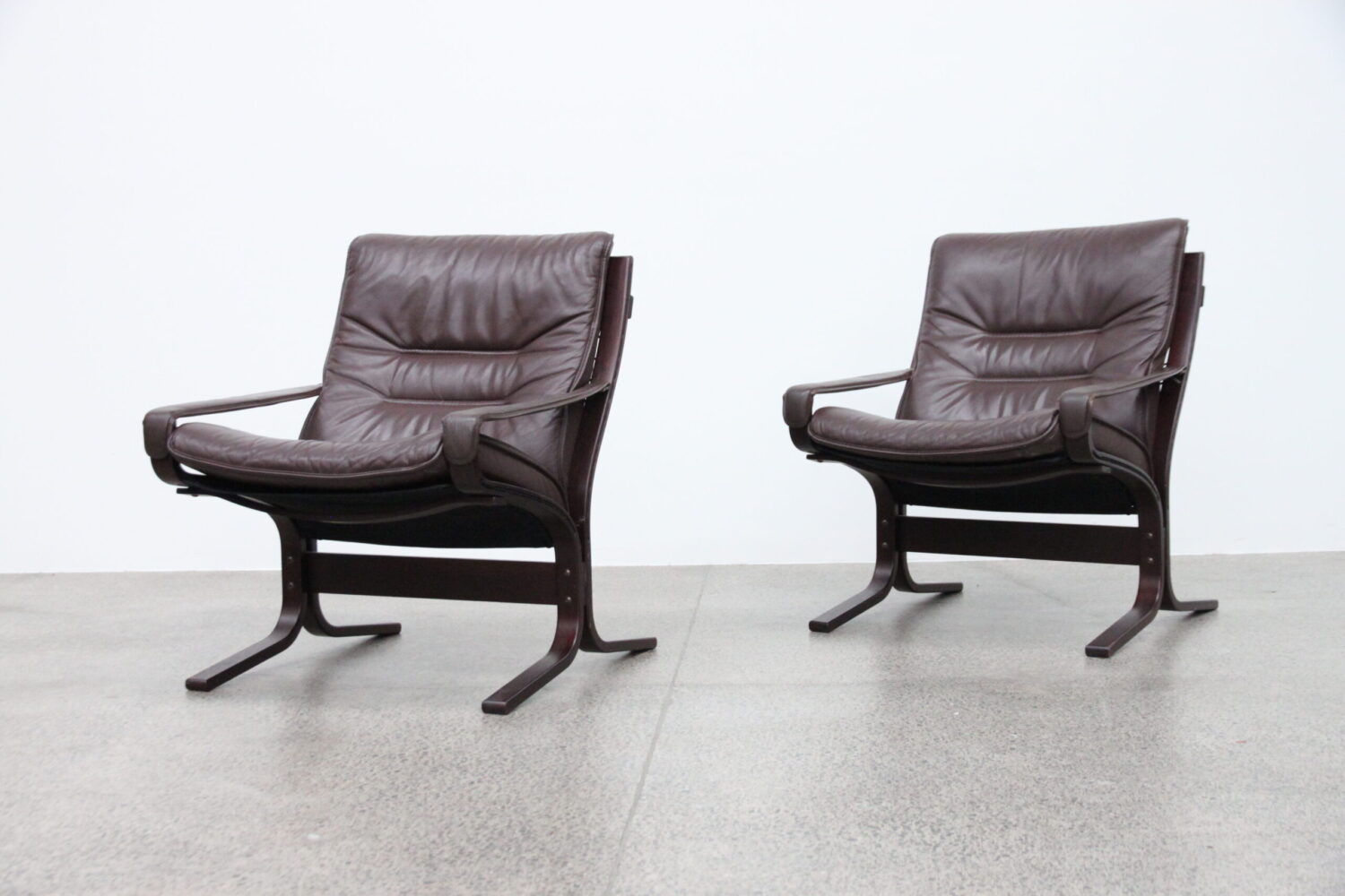 Pair Of Leather Siesta Chairs