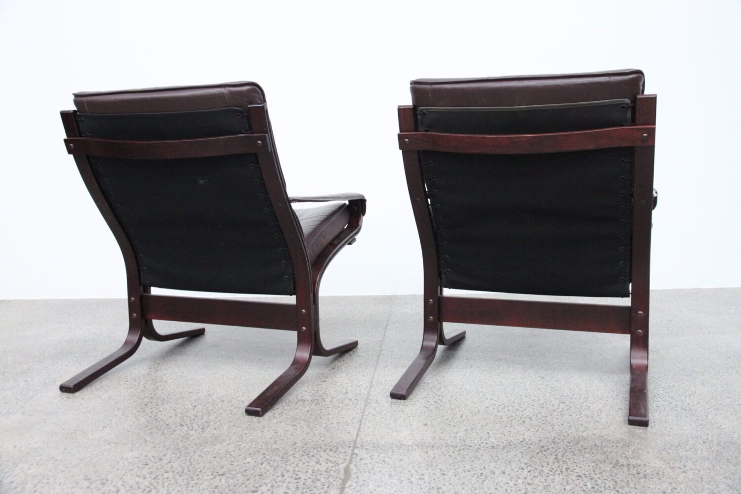 Pair Of Leather Siesta Chairs