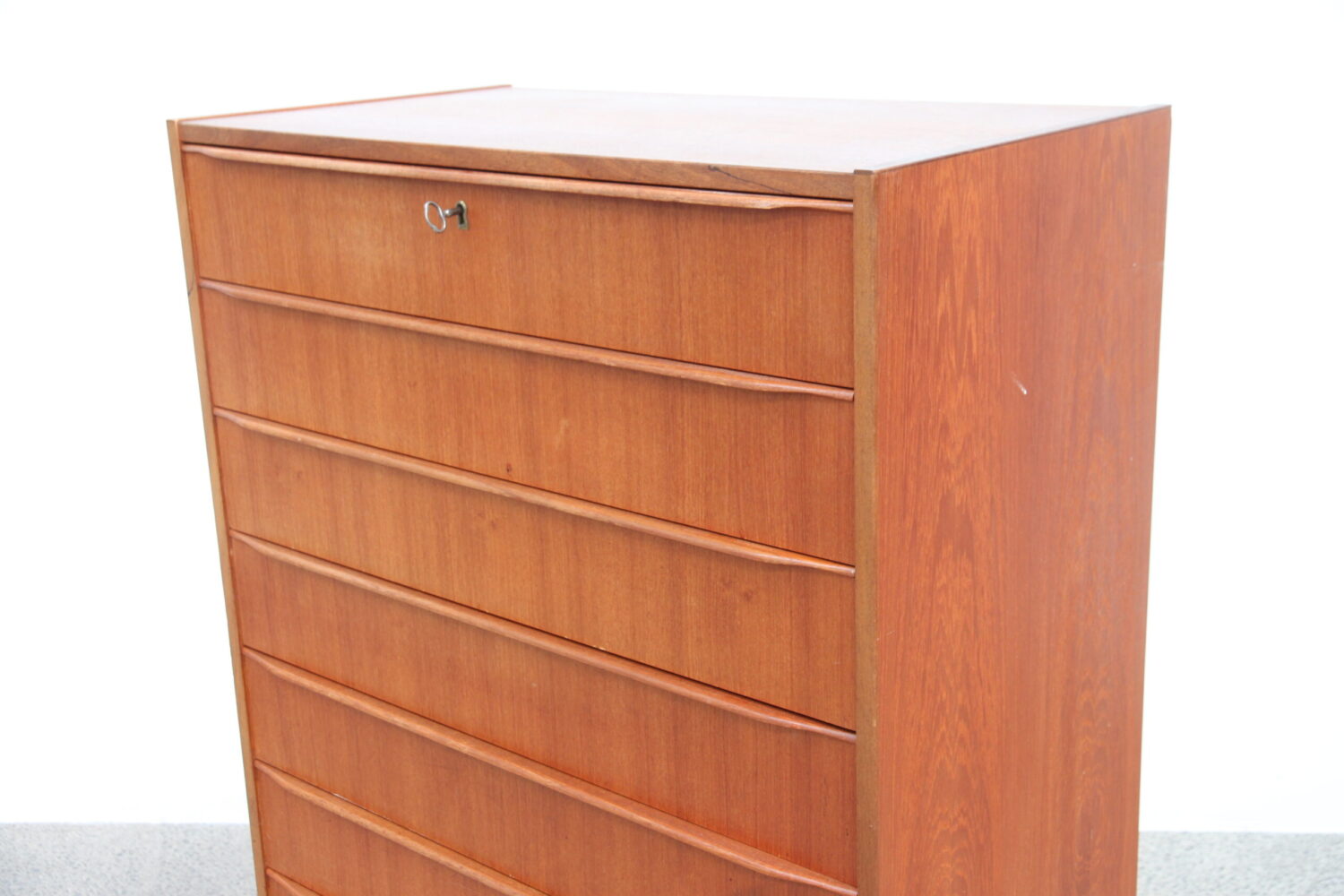 A Large 8 Drawer Teak Tallboy