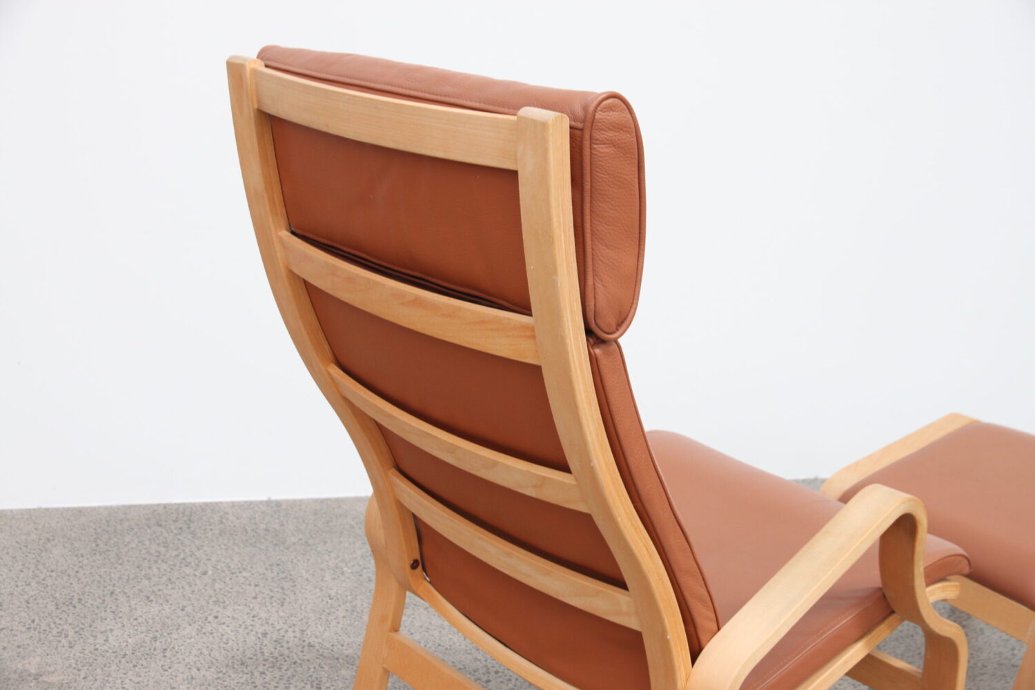 Pair of Tan Leather Armchairs by Finn Ostergaard