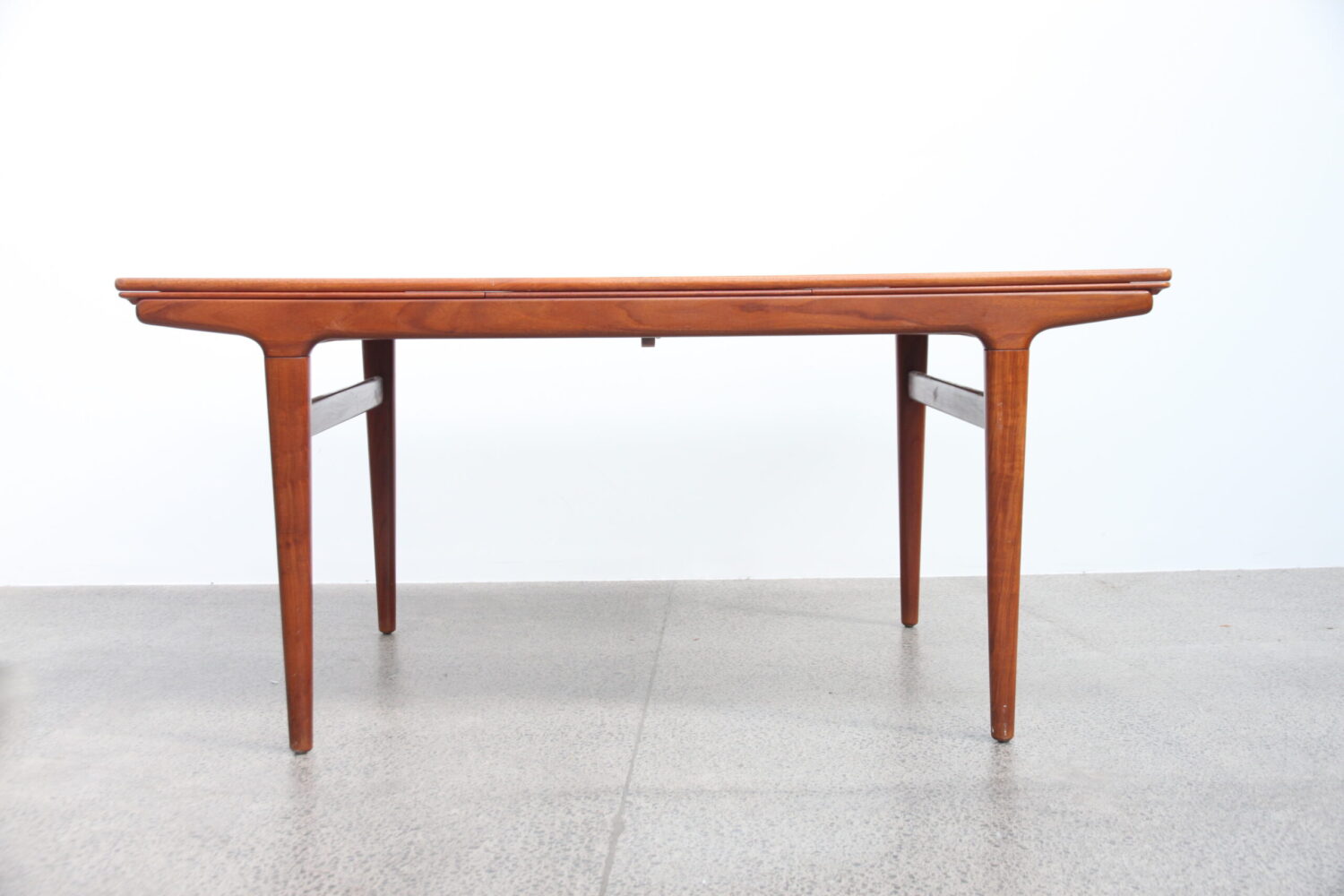 A 7 Piece Dining Suite by Johannes Andersen