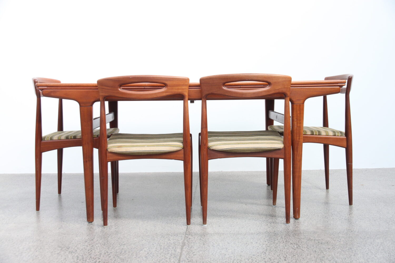 A 7 Piece Dining Suite by Johannes Andersen