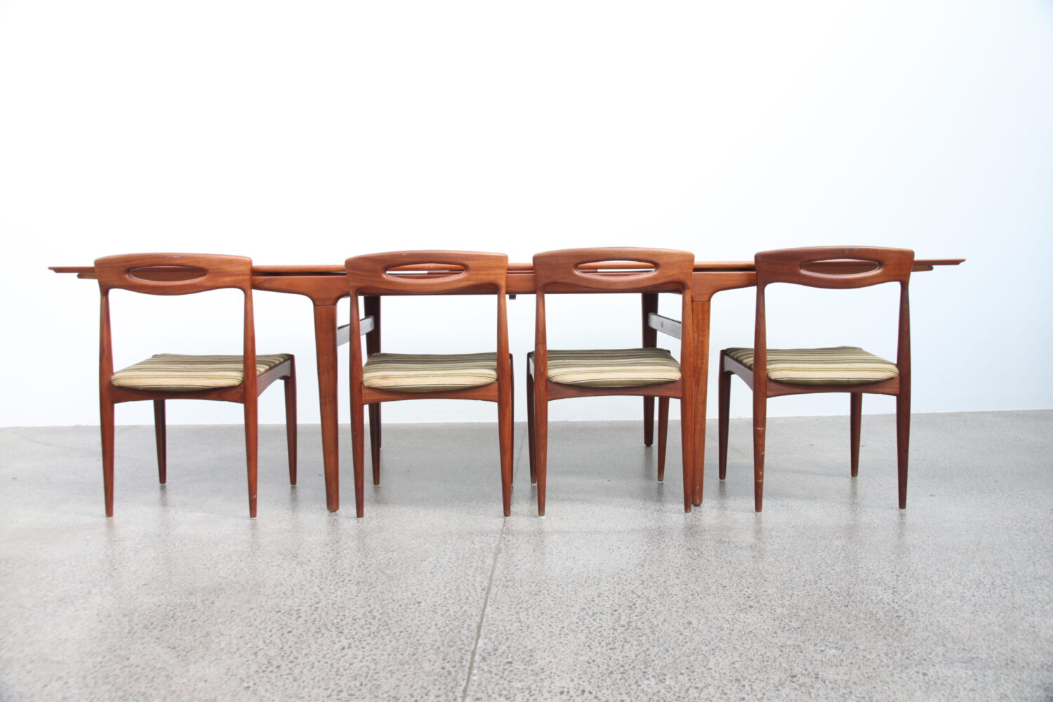 A 7 Piece Dining Suite by Johannes Andersen