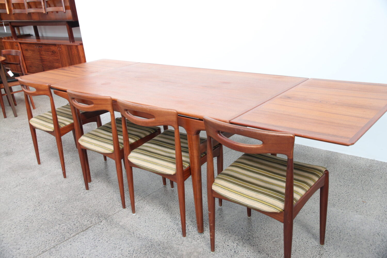 A 7 Piece Dining Suite by Johannes Andersen
