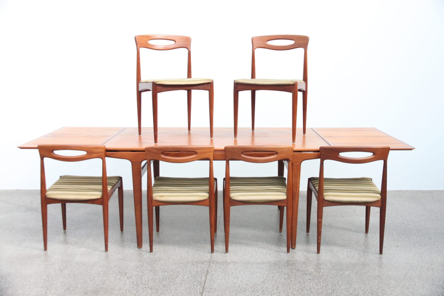 A 7 Piece Dining Suite by Johannes Andersen